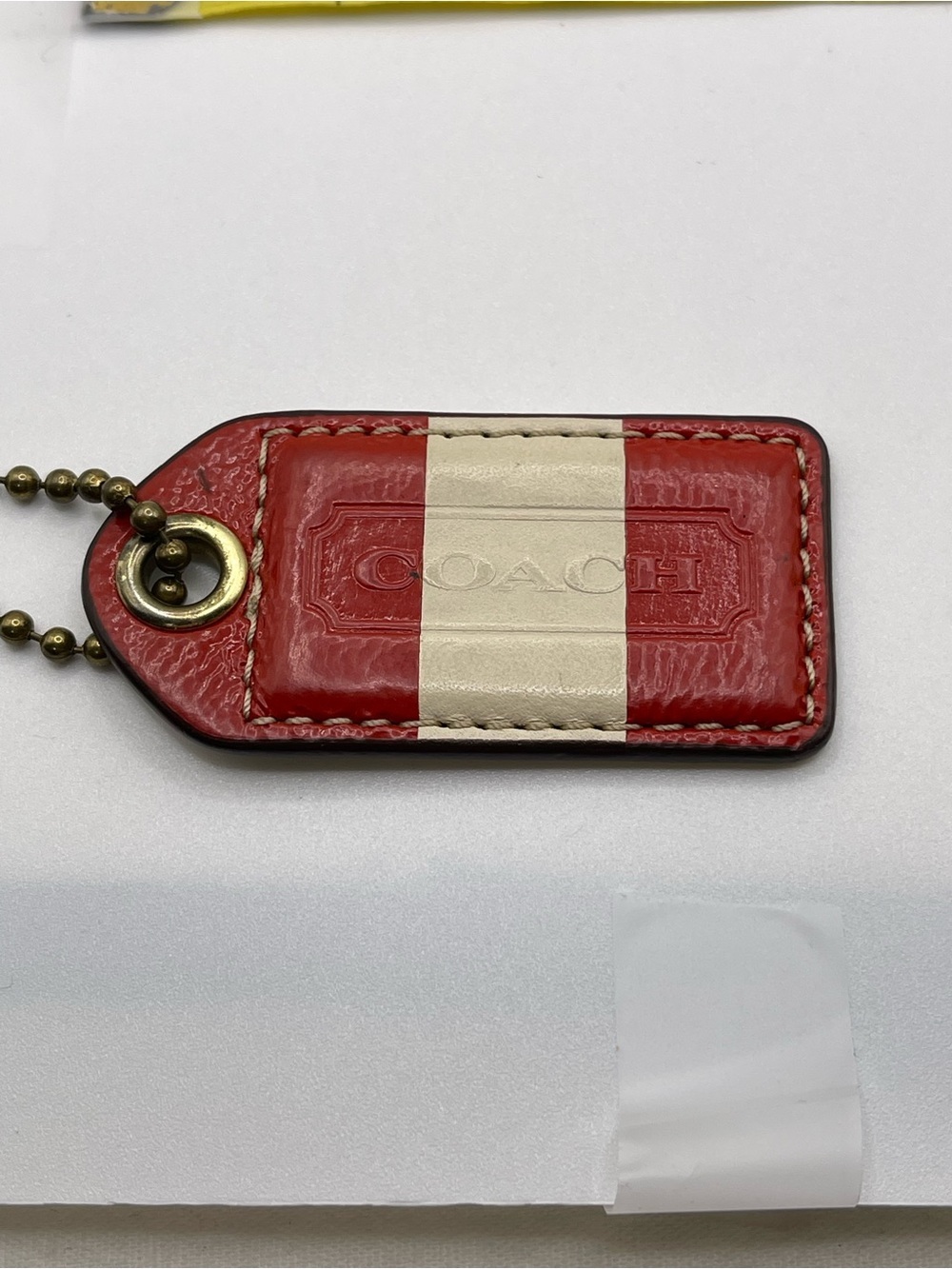 Coach Cream and Red Leather Hang Tag with Brass Ball Chain